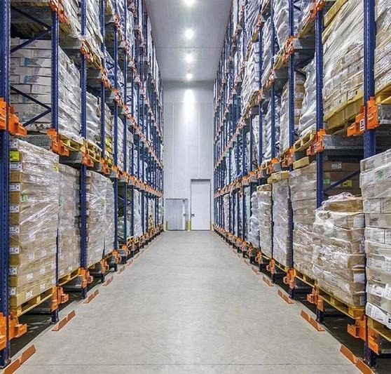 Cold storage warehouse with racked pallets